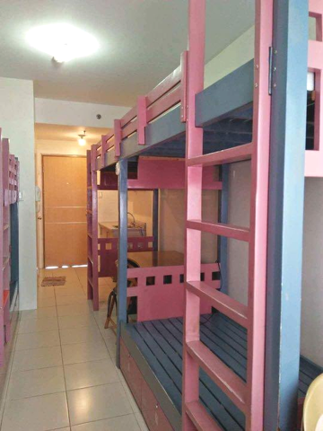 AVAILABLE COZY CONDO UNIT FOR RENT FRONTING U.P. Manila and Robinson
